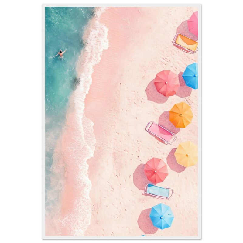 Sombrillas de playa coloridas en arena rosa junto al mar, ideal para vacaciones y descanso en la playa.