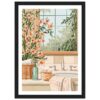 Jarrón con flores y artículos de baño en un lavabo frente a una ventana con vista al jardín.